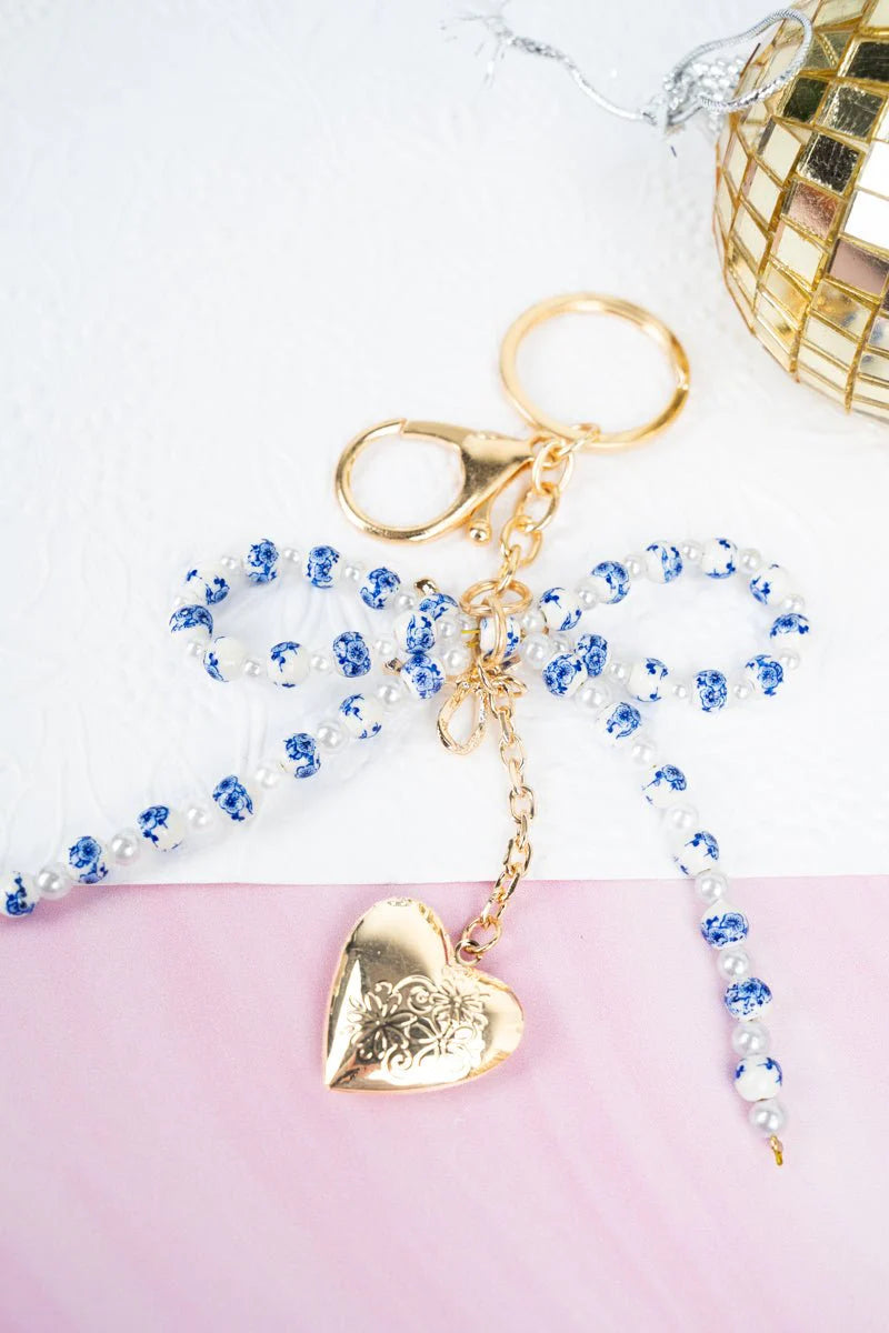 Crystal Avenue Blue Flower Beaded Bow Keychain